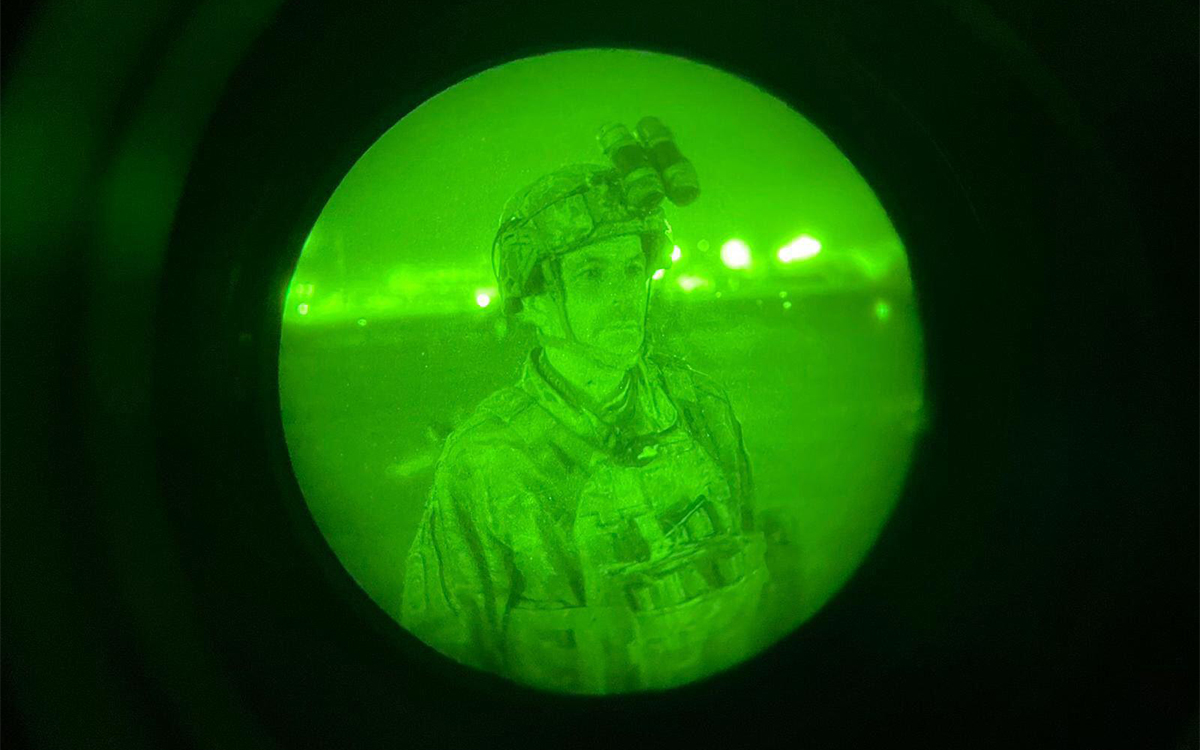 Major General Chris Donahue, commander of the U.S. Army 82nd Airborne Division, XVIII Airborne Corps, boards a C-17 cargo plane at the Hamid Karzai International Airport in Kabul, Afghanistan. Maj. Gen. Donahue was the final American service member to depart Afghanistan in 2021. (photograph by Master Sgt. Alex Burnett/Afghanistan Archive/Alamy)